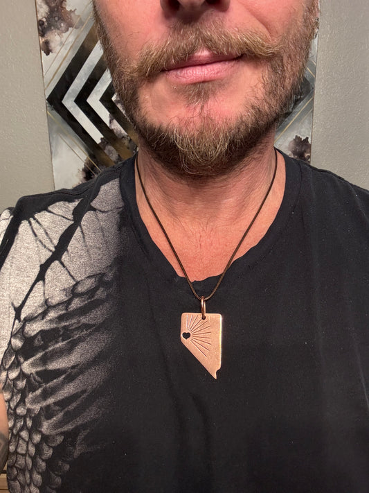 Nevadans gotta Nevada pendant
