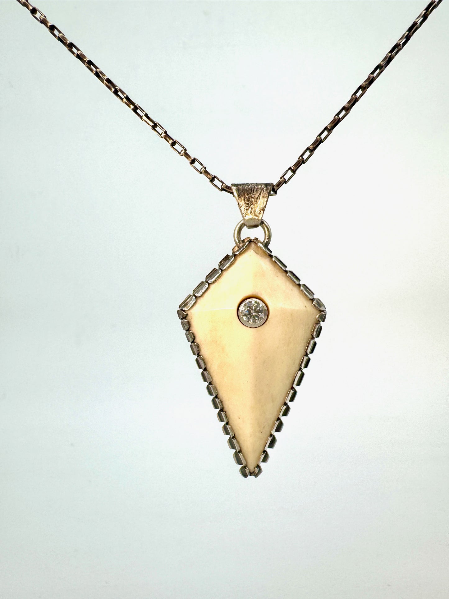 Bone and Moissanite pendant