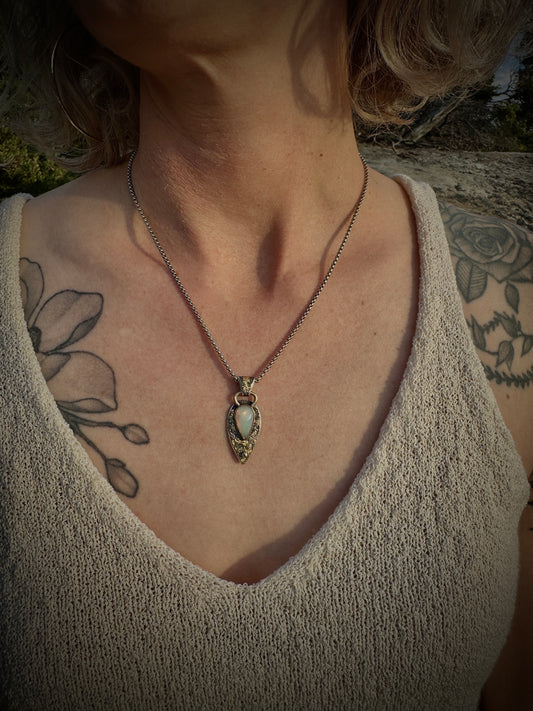 Dragons Eye pendant with white opal